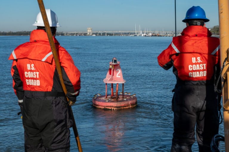 U.S. Coast Guard personnel, assigned to USCG Sector Charleston Aids To Navigation Team, prepare to hoist a buoy from the water during a training mission aboard a 49’ Buoy Utility Stern Loading boat in Charleston, South Carolina, Feb. 8, 2024. The ANT Charleston has a crew of 10 personnel who are responsible for the maintenance and care of all aids to navigation in the Charleston area. (U.S. Air Force photo by Tech. Sgt. Alex Fox Echols III)