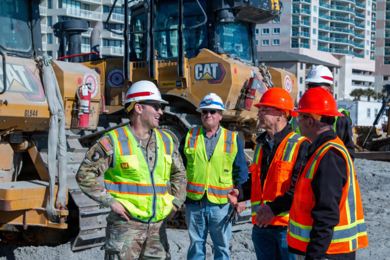 Lt. Col. Todd Mainwaring, commander of the U.S. Army Corps of Engineers, Charleston District, meets with City of North Myrtle Beach Mayor J.O. Baldwin and local stakeholders during a site visit of the Grand Strand Renourishment project in North Myrtle Beach, South Carolina, Jan. 22, 2026.

In December 2024, the Charleston District awarded a contract to Great Lakes Dredge and Dock Company to place approximately two million cubic yards of sand—equivalent to 200,000 dump trucks—along 26 miles of Myrtle Beach. Construction began on the northern end of North Myrtle Beach in December 2025.

The $72 million project is fully funded by the U.S. Army Corps of Engineers and is designed to reduce the risk to life and protect critical infrastructure behind the dunes along the Grand Strand. The renourishment has performed as designed during recent storms, including Hurricane Ian in September 2022 and Hurricane Debby in August 2024, reducing erosion and storm-related damages.