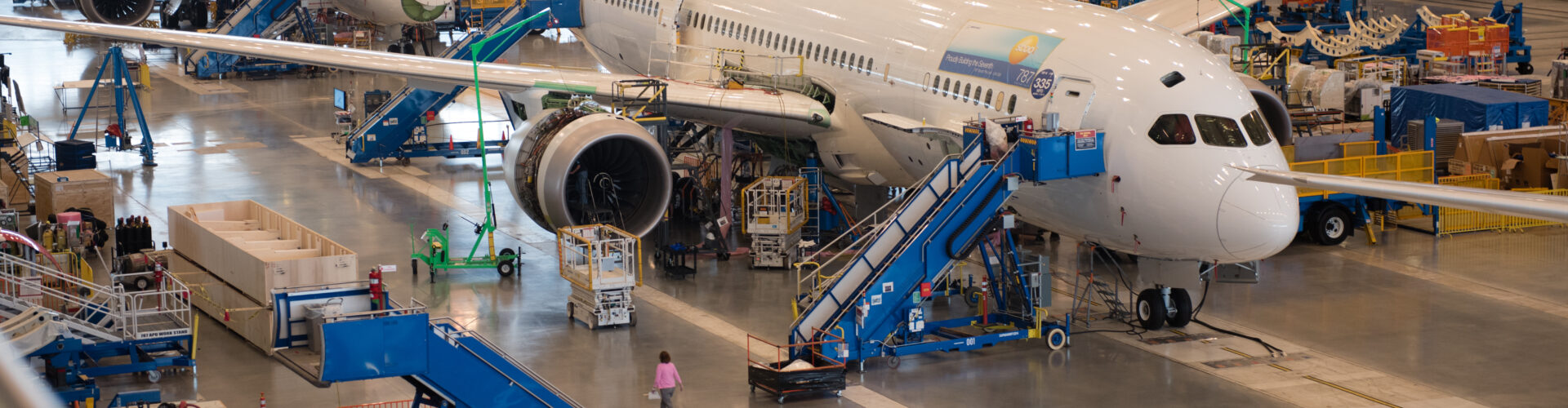 Four passenger airplanes sit in a hangar in the Charleston region.