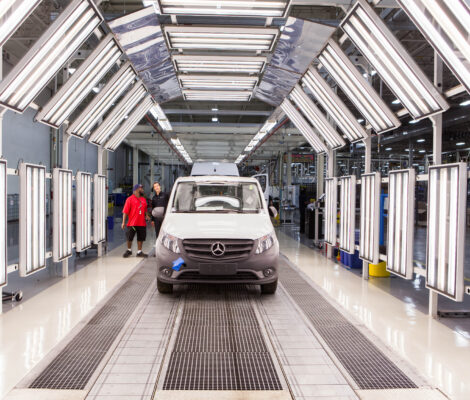 A Mercedez van in a manufacturing facility.